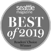 The image displays a circular badge that reads "Seattle Magazine Best of 2019 Readers' Choice Winner" in gray.