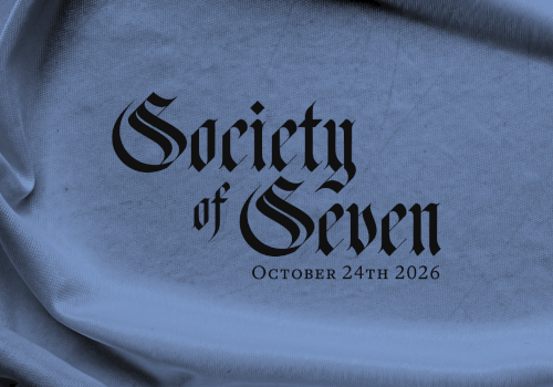 A blue draped banner reading &ldquo;Society of Seven,&rdquo; dated October 24th, 2026, with a dark crest at bottom right.