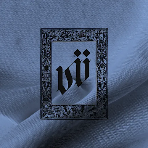 A blue draped fabric background with a centered black gothic emblem in an ornate frame.